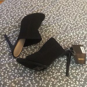 Black stretch open toed mules